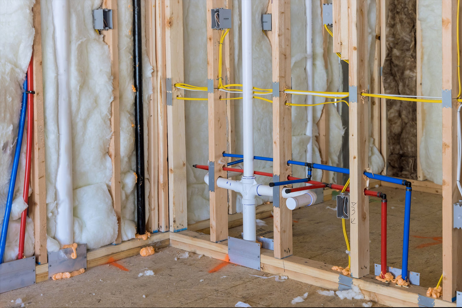 plastic PEX pipes and fittings on a water line